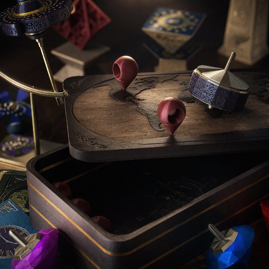 A collection of Prime Tower Designs pieces, including spinning tops on a map box